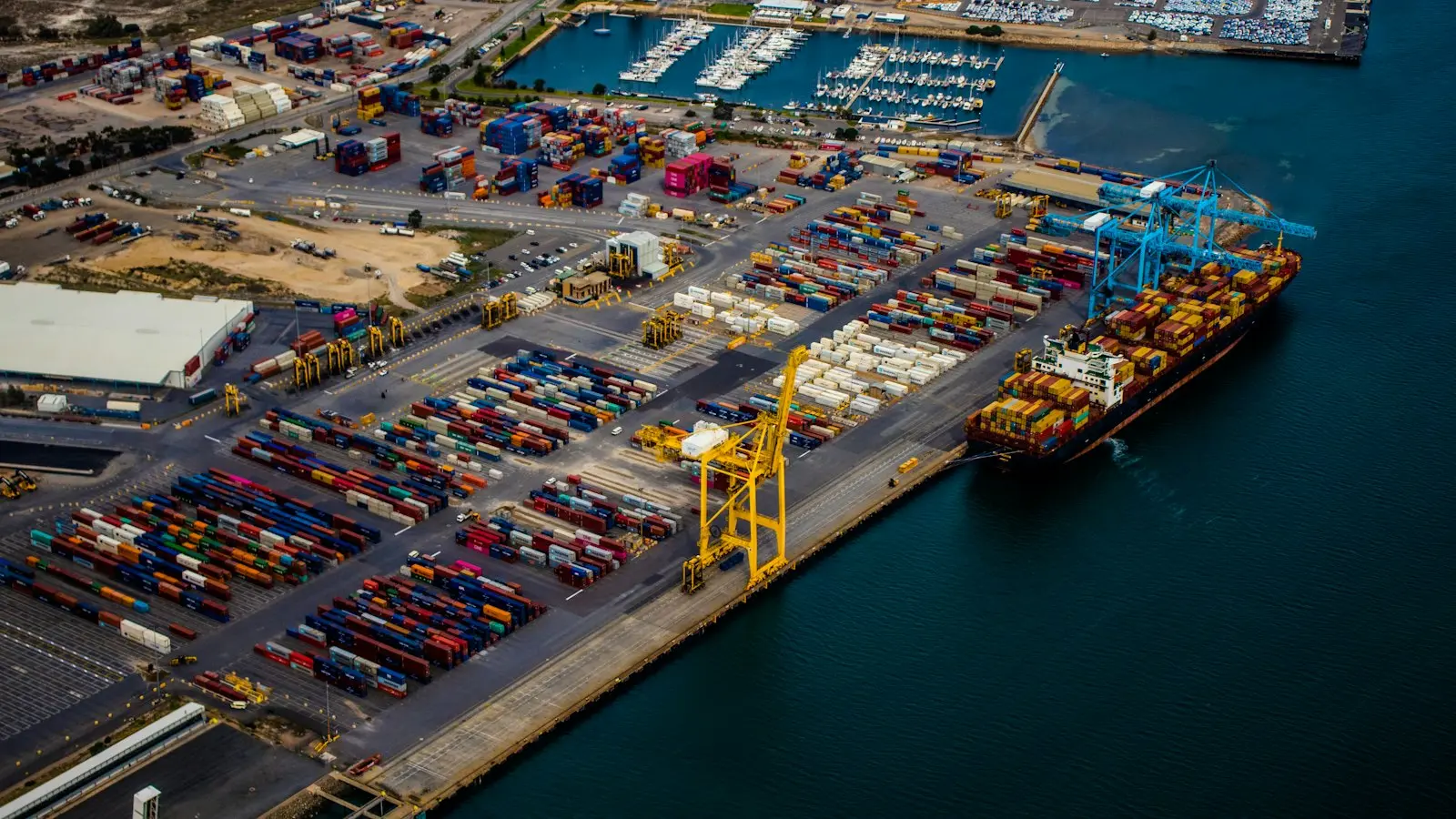 Container port with a vessel berthed alongside